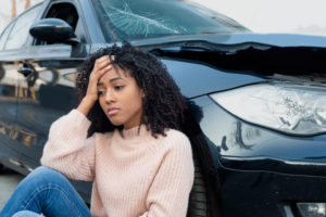 woman feeling sad after her car accident